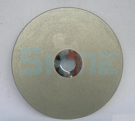 Diamond sanding and polishing disk